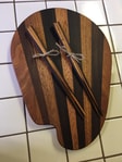Wooden sculpture with natural grain